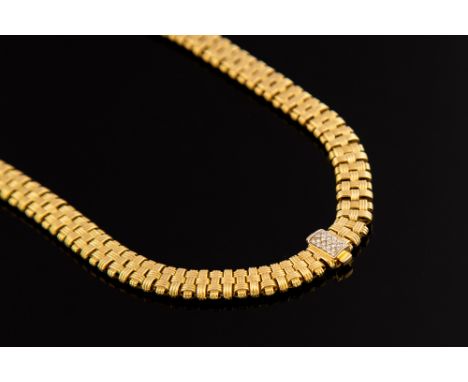 A Roberto Coin 18ct yellow gold fancy link necklace, with interwoven design to links  diamonds and ruby set to the clasp, app