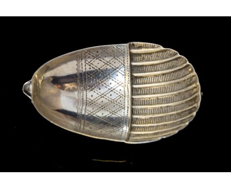 An unusual George III silver Acorn shaped caddy spoon, the inside with bright cut geometric border, maker's mark probably tha