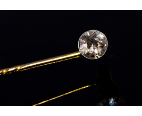 A diamond solitaire yellow gold stick pin, the round old-cut diamond approx 0.50ct, rub-over set to detachable mount with scr