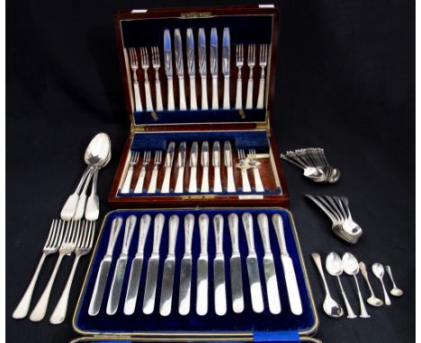 A collection of flatware including: A George&nbsp; V set of six silver and mother-of-pearl mounted fruit forks and knives, Ma