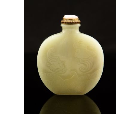 A Chinese pale jade snuff bottle, carved on one side with a blossom tree, the other side with two bats over an ocean, polishe