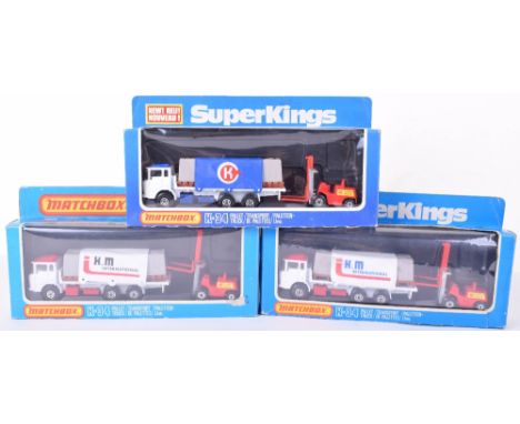 Three Matchbox Superkings  K34 DAF Pallet Truck with Fork lift Trucks,  blue/ red K.M International logo, black/ red K.M Inte