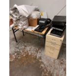 Contents of room Table, file cabinet and computer with Monitor (contents on table and wit