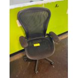 Swivel arm chair