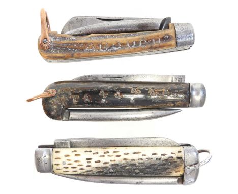 Three pocket knives Three horn grip army pocket knives, each with spike, one with RFA 44444 engraved into the grip, another n