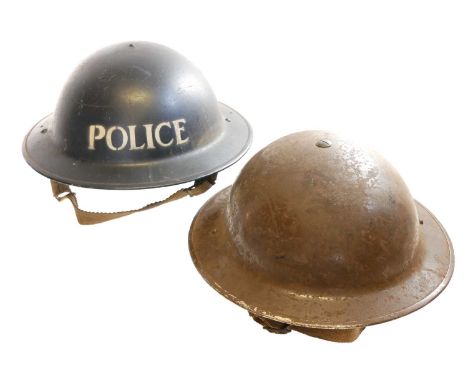 WWII British Police Brodie helmet and one other WWII British Police Brodie helmet, stamped BMR, together with one other dated