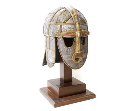 Replica Sutton Hoo Helmet, Replica Sutton Hoo Helmet on wood stand. The helmet measures 31cm high 