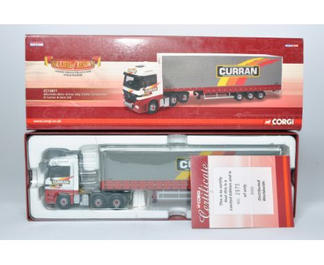 Corgi 1/50 diecast model truck issue comprising No. CC13811 Mercedes Benz Curtainside in the livery Curran. Looks generally g