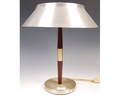 A 1970's retro vintage Danish table lamp light raised on a circular base with teak column having tubular metal spacer and chr