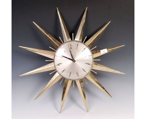 Metamec - Sunburst - A 20th Century retro vintage wall clock having gilt brass points with central circular dial having a sil