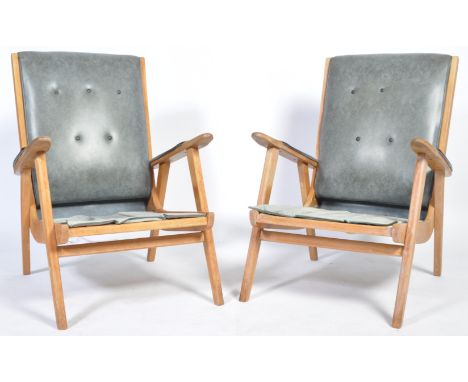 A pair of 1960's retro vintage easy / lounge chair / armchairs having a beech frame construction with angular type legs and b