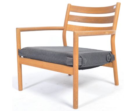 Habitat - JED - A contemporary designer Danish inspired low ladder back easy / lounge chair / armchair having an oak frame wi