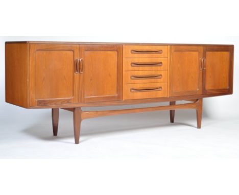 Victor. B. Wilkins - G Plan - Fresco range - A 1960's retro vintage teak wood credenza sideboard. The sideboard comprising a 