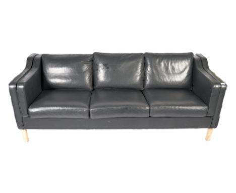 A late 20th century Danish retro vintage Borge Mogensen style three seat sofa settee having the stepped armrests having cushi