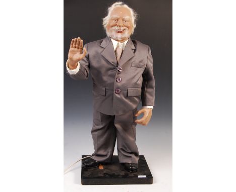 An unusual 20th Century vintage advertising point of sale shop display tailors automaton figurine in the form of a man wearin