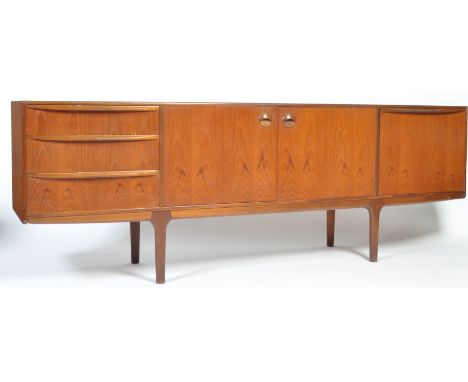 Tom Robertson - A.H. Mcintosh Of Kirkcaldy - Dunvegan Range - A 1960's retro vintage teak wood sideboard credenza unit having