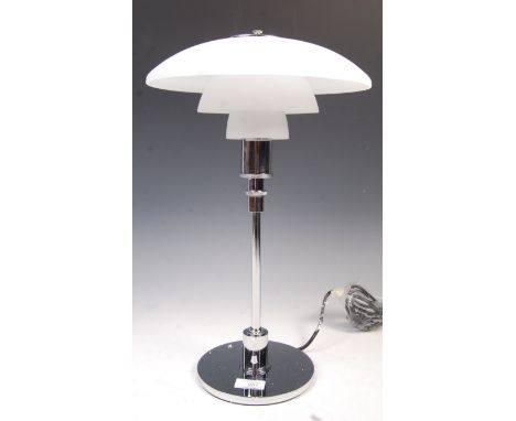 After Poul Henningsen - PH 3/2 - A contemporary glass desk / table lamp / light. The lamp consisting of three frosted glass s