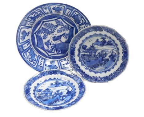 A pair of 18thC Chinese export porcelain blue and white plates, painted with a riverscape and pagodas, 16cm wide, together wi