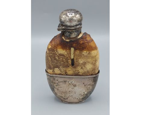 A glass and Birmingham silver mounted hip flask, 12.5cms tall 
