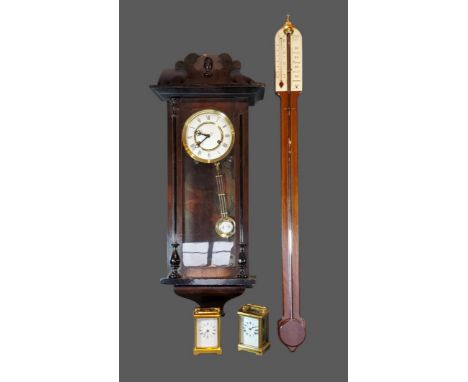 A French brass cased Carriage clock with lever escapement together with another similar Carriage clock, a stick barometer by 