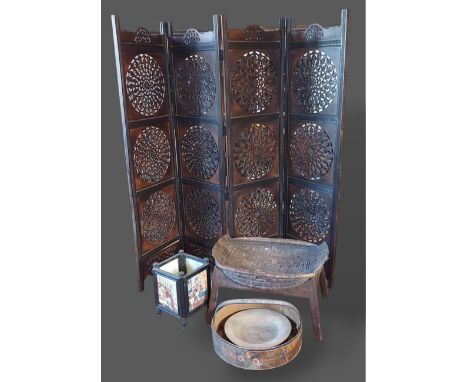 A four fold screen of pierced form together with a crib, a jardiniere, a trough and a wooden dish 