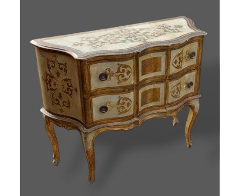 A French painted small commode with two drawers raised upon cabriole legs with scroll feet, 100cms wide, 40cms deep and 80cms