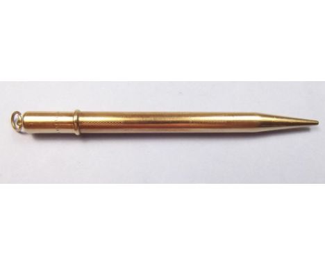 A 9 carat gold propelling pencil with vacant cartouche and engine turned decoration - 20g