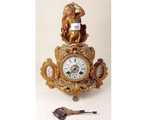 A French gilt metal and porcelain mantel clock with cherub surmount stamped Mour to back - 30cm