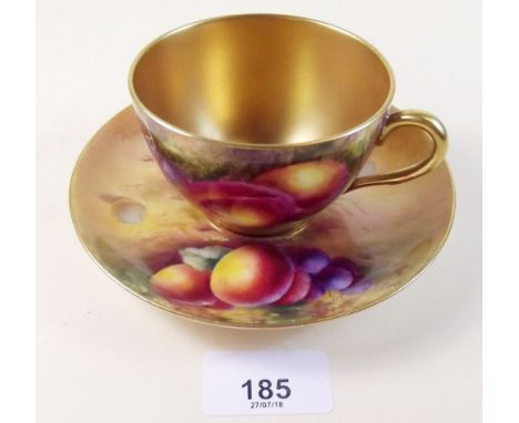 A Royal Worcester matched cup and saucer painted fruit - peaches and cherries by Freeman and A G Moseley