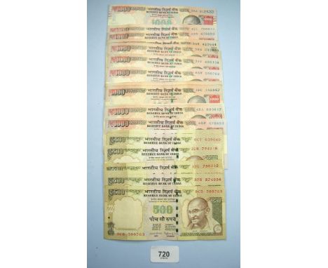 A wad of Reserve of Bank of India 500 Rupee notes x 7 and 1000 Rupees x 12 (Mahatma Ghandi portrait to the right) - Condition