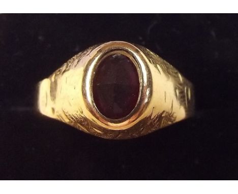 A gold ring with conical mount set cornelian - unmarked, 2.6g