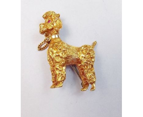 An 18 carat gold poodle brooch with ruby eyes, 15g