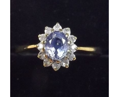 A 9ct gold pale sapphire and diamond cluster ring - Size M