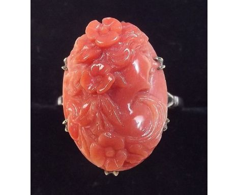 A 9 carat white gold ring set carved coral bust of Art Nouveau woman - size K1/2