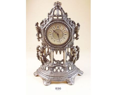 A cast French style Splendex clock with cherub design
