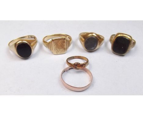 A 9 carat gold signet ring and a 9 carat gold wedding band, total 5.7g plus two 9 carat gold stone set signet rings, 8.6g - a