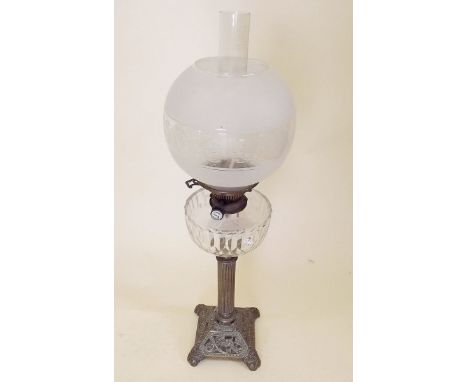 A Hinks's No 2 Duplex oil lamp on cast base with column support and frosted shade