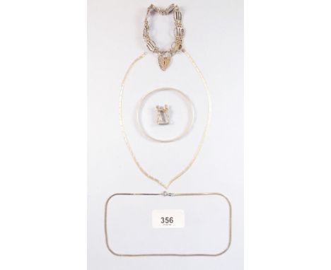 Two silver necklaces, a silver gate link bracelet, a silver chain and a bangle - 55g total 