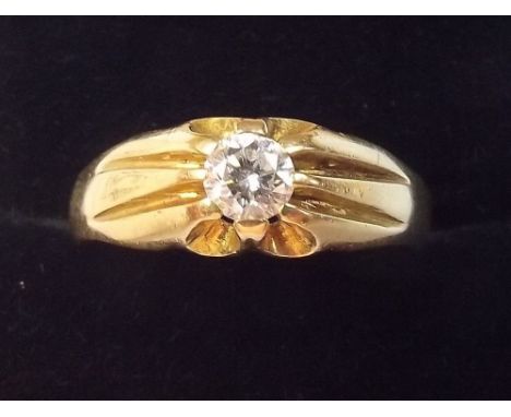 An 18 carat gold diamond solitaire ring