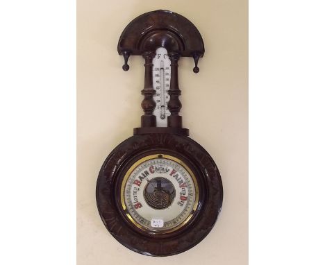 A mahogany cased barometer/thermometer