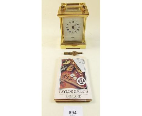 A Martin and Co brass cased carriage clock - 12cm