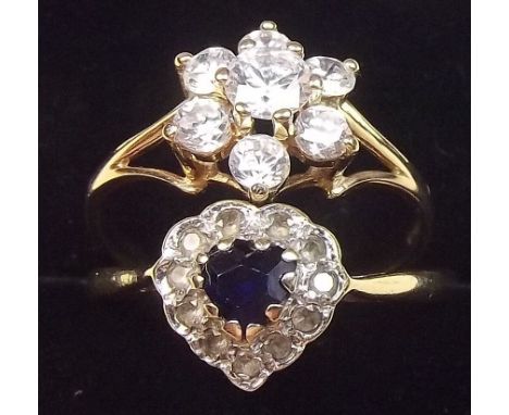 A 9 carat gold ring set sapphire and white stones, size M and a white stone cluster ring, size L