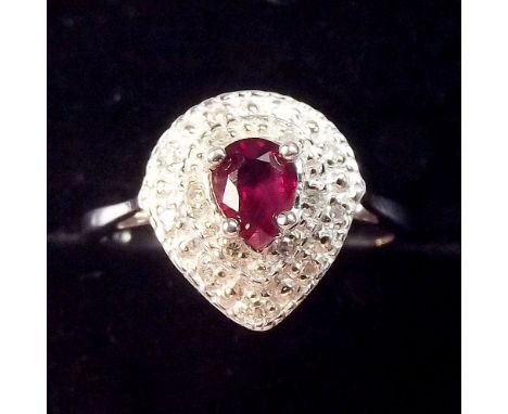 A 9K white gold ruby and diamond tear drop form ring -size M1/2