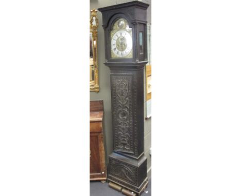 An 18th century oak longcase clock, George Thornburgh, London, with brass dial, later carved case, brass weights, 220cm high 