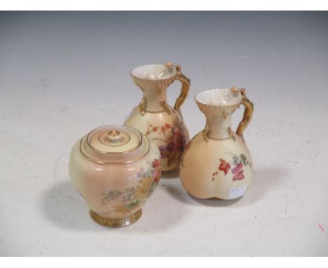 Two Royal Worcester cleft jugs and a jar and cover  