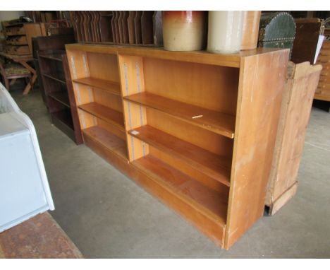 A beech double sided 1950's adjustable book shelf    83w x 38d x 100h cm 