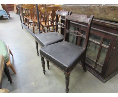 A pair of Regency mahogany chairs on ring-turned legs