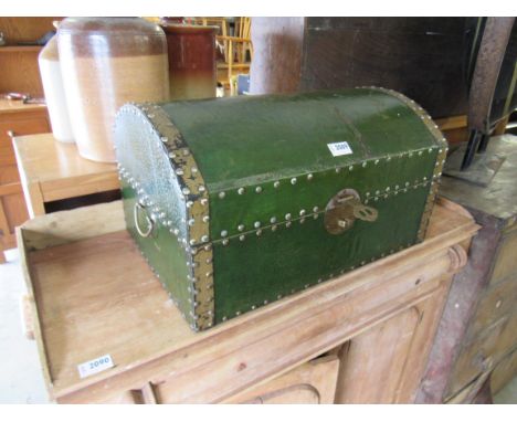 A green dome top trunk with black lacquered interior and metal banding with stud decoration    53cm w  