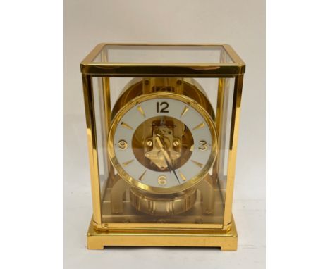 A Jaeger-LeCoultre Atmos clock, gilt and lacquered brass case, no. 540348, 30cm high approx. 