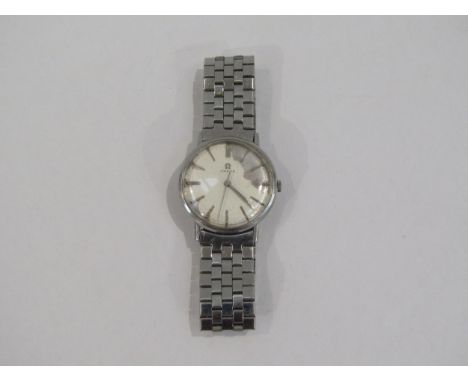 An Omega stainless steel cased manual wind gent's wristwatch, silvered dial heavily worn, centre seconds 